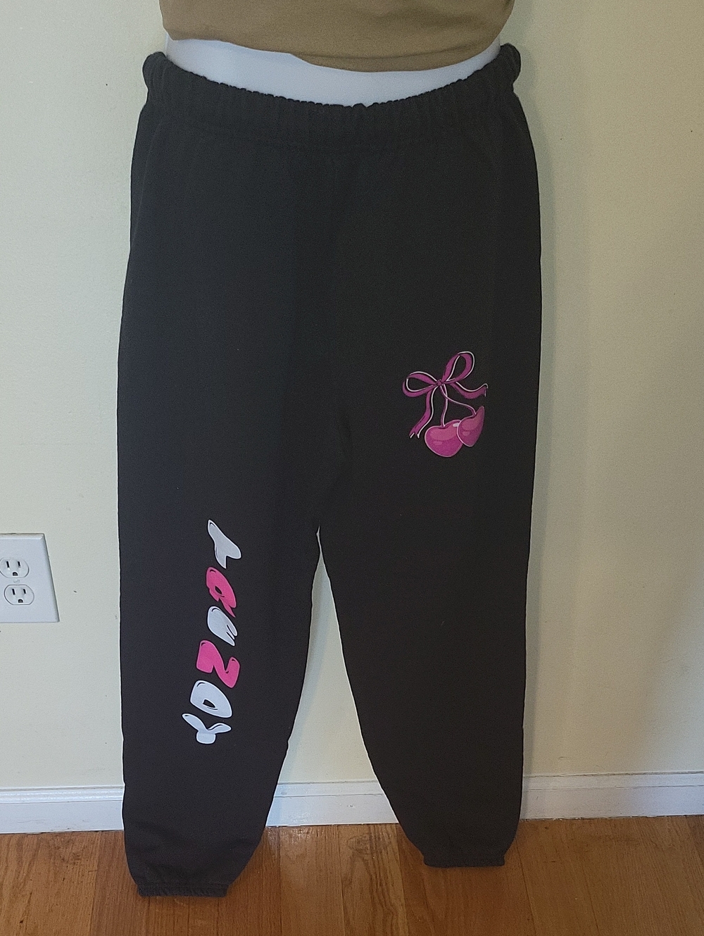 Black Cuffed Sweatpants with Pink Cherry Graphic